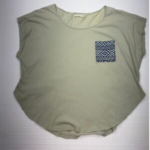KK intl. light sage green short sleeve shirt w/ geometric pattern. size small.